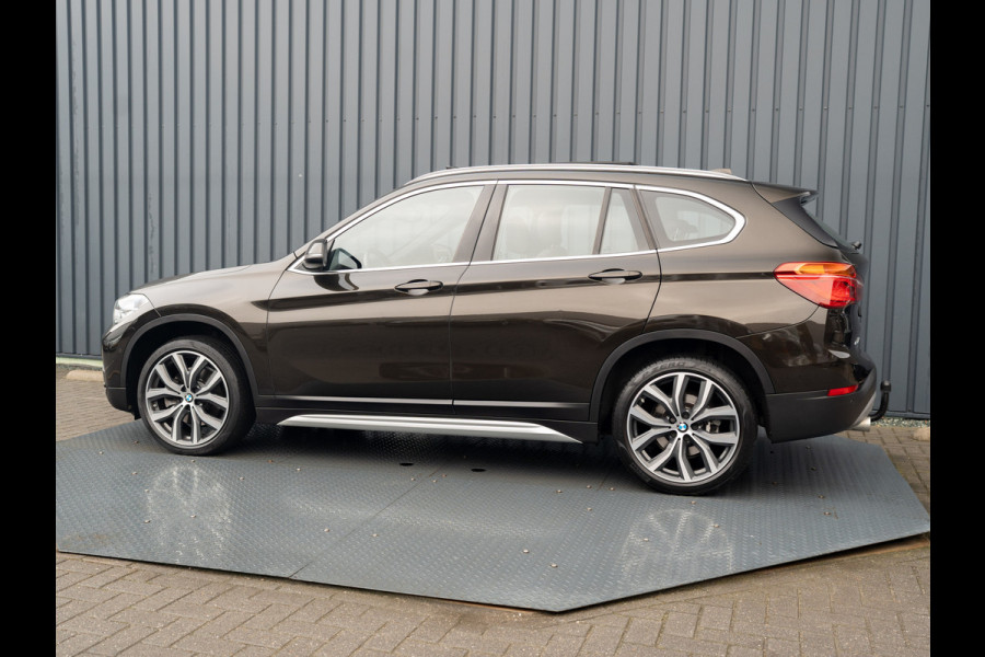 BMW X1 sDrive20i High Executive | Trekhaak afnb. | Panodak | Head Up | Camera | Elk. A-klep | Leder | Prijs Rijklaar!!