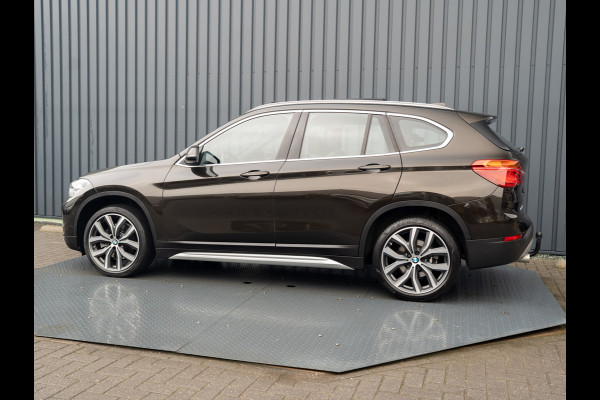BMW X1 sDrive20i High Executive | Trekhaak afnb. | Panodak | Head Up | Camera | Elk. A-klep | Leder | Prijs Rijklaar!!