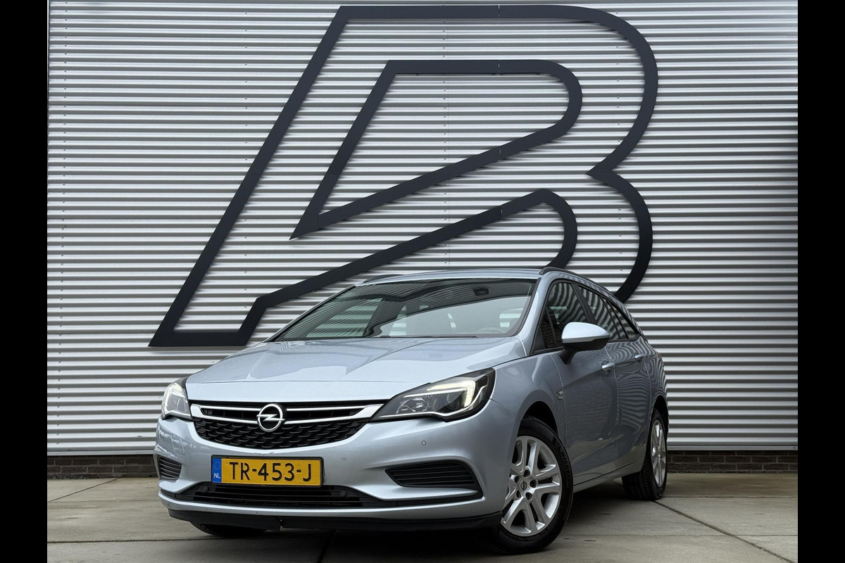 Opel Astra Sports Tourer 1.4 Online Edition 2e Eigenaar|Navi|Trekhaak|Clima|Cruise|PDC V+A|N.A.P|APK tot 09-2026