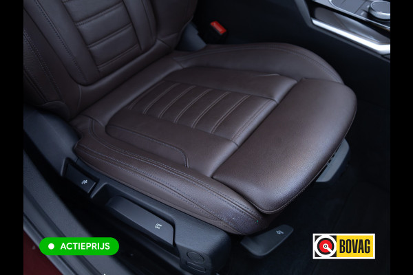 BMW 3 Serie Touring 320e Business Edition Plus | Laser | Camera | PDC V+A | Elec. achterklep | Cruise | Navigatie pro | Apple carplay/Android auto, Lederen bekleding, 18"LMV
