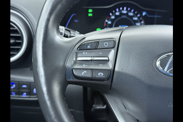 Hyundai Kona EV 64kWh 204pk SOH 100% Premium Leer Warmtepomp Head-Up Display Apple Carplay Android Navi Camera Elektr.Stoelen+Leer+Verwarmd+G Pdc Subwoofer Bluetooth Dodehoek detector Privacy Glas Rijstrooksensor 1e Eigenaar Origineel Nederlandse Auto