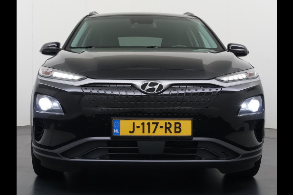Hyundai Kona EV 64kWh 204pk SOH 100% Premium Leer Warmtepomp Head-Up Display Apple Carplay Android Navi Camera Elektr.Stoelen+Leer+Verwarmd+G Pdc Subwoofer Bluetooth Dodehoek detector Privacy Glas Rijstrooksensor 1e Eigenaar Origineel Nederlandse Auto