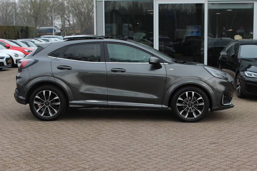 Ford Puma 1.0 EcoBoost Hybrid ST-Line X Vignale 155pk / NL Auto! / Full option! / Trekhaak / Panoramadak / Camera / Leder / CarPlay / B&O / 18'' / Keyless / Stuur+Stoelverwarming / Dodehoek / DAB / Verwarmde voorruit / ACC
