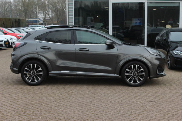 Ford Puma 1.0 EcoBoost Hybrid ST-Line X Vignale 155pk / NL Auto! / Full option! / Trekhaak / Panoramadak / Camera / Leder / CarPlay / B&O / 18'' / Keyless / Stuur+Stoelverwarming / Dodehoek / DAB / Verwarmde voorruit / ACC