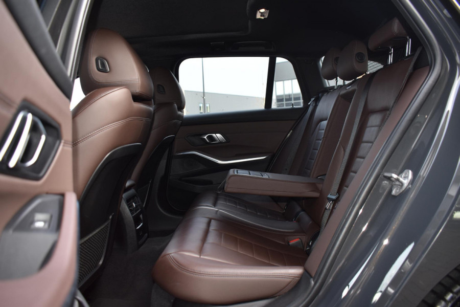BMW 3 Serie Touring 330e Plugin Hybrid 292PK Aut. M-Sport | Panodak | Dravitgrau Individual | Trekhaak | Leder | Incl. garantie