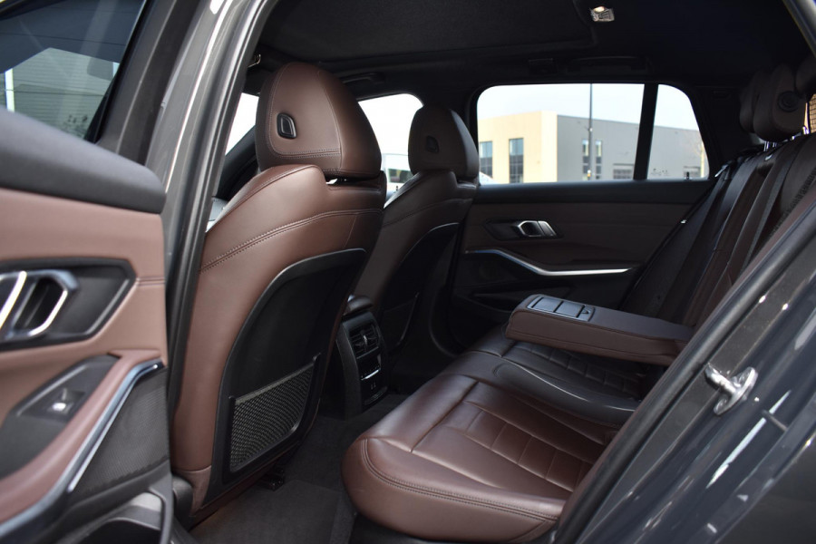 BMW 3 Serie Touring 330e Plugin Hybrid 292PK Aut. M-Sport | Panodak | Dravitgrau Individual | Trekhaak | Leder | Incl. garantie