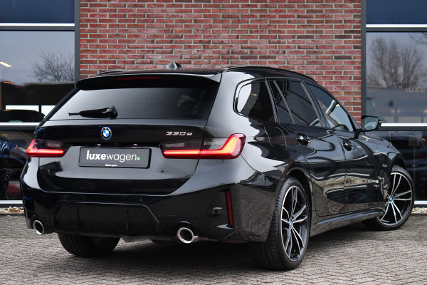 BMW 3 Serie Touring 330e M-Sport Pano ACC Trekh H/K HUD 19inch Stuurverw
