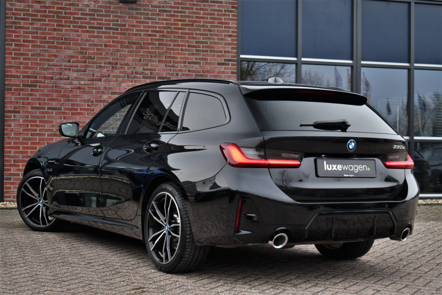 BMW 3 Serie Touring 330e M-Sport Pano ACC Trekh H/K HUD 19inch Stuurverw
