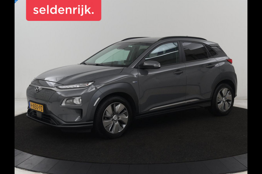 Hyundai Kona EV Premium 64 kWh | SOH 100% | 3 Fase | Stoelventilatie | Head-Up | Leder | Adaptive cruise | Carplay | Stoelverwarming | Navigatie | Keyless | Climate control