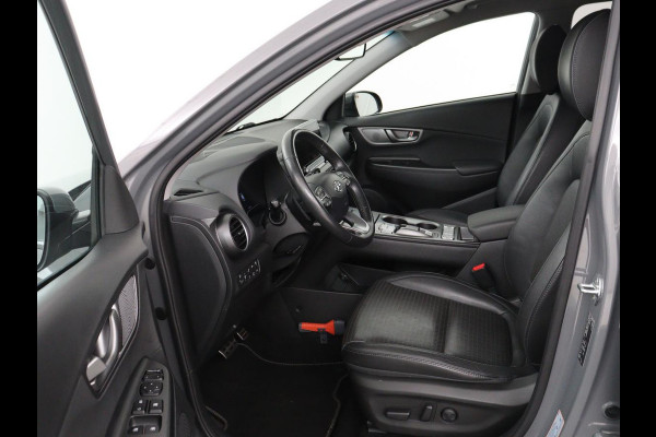 Hyundai Kona EV Premium 64 kWh | SOH 100% | 3 Fase | Stoelventilatie | Head-Up | Leder | Adaptive cruise | Carplay | Stoelverwarming | Navigatie | Keyless | Climate control