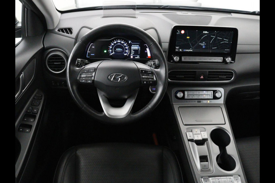 Hyundai Kona EV Premium 64 kWh | SOH 100% | 3 Fase | Stoelventilatie | Head-Up | Leder | Adaptive cruise | Carplay | Stoelverwarming | Navigatie | Keyless | Climate control
