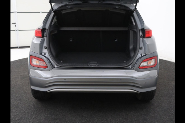 Hyundai Kona EV Premium 64 kWh | SOH 100% | 3 Fase | Stoelventilatie | Head-Up | Leder | Adaptive cruise | Carplay | Stoelverwarming | Navigatie | Keyless | Climate control