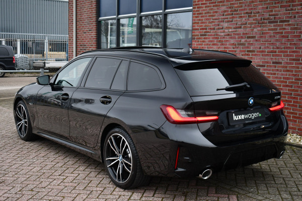 BMW 3 Serie Touring 330e M-Sport Pano ACC Trekh H/K HUD 19inch Stuurverw