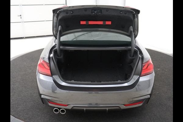 BMW 4 Serie Coupé 418i M Sport | Schuifdak | Leder | Stoelverwarming | 20'' | Sportstoelen | Full LED | Navigatie | Parkeerhulp | Climate control | Cruise control | 74.200km NAP