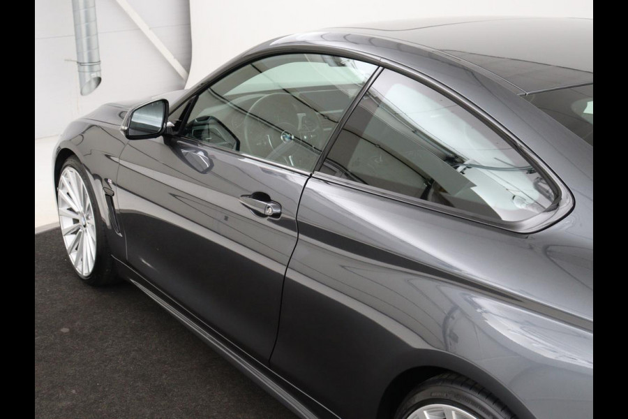 BMW 4 Serie Coupé 418i M Sport | Schuifdak | Leder | Stoelverwarming | 20'' | Sportstoelen | Full LED | Navigatie | Parkeerhulp | Climate control | Cruise control | 74.200km NAP