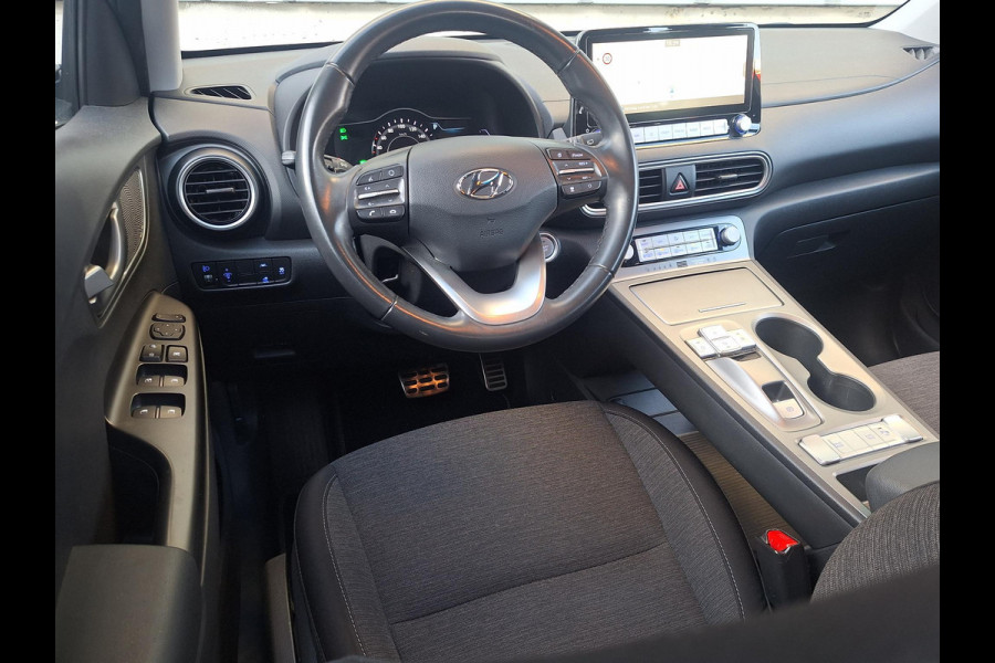 Hyundai Kona EV Comfort 64 kWh | SOH: 95,5% | 3 Fase | Warmtepomp | Navi | Adaptive CC | Climate |
