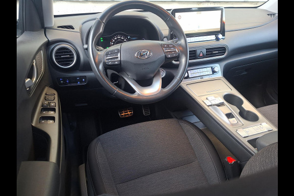 Hyundai Kona EV Comfort 64 kWh | SOH: 95,5% | 3 Fase | Warmtepomp | Navi | Adaptive CC | Climate |