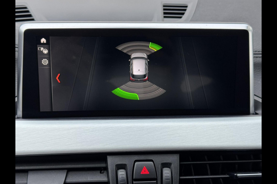 BMW X1 SDrive18i High Executive Cruise Climate control Leer+memory Sfeerverlichting Navigatie Full LED Parkeersensoren