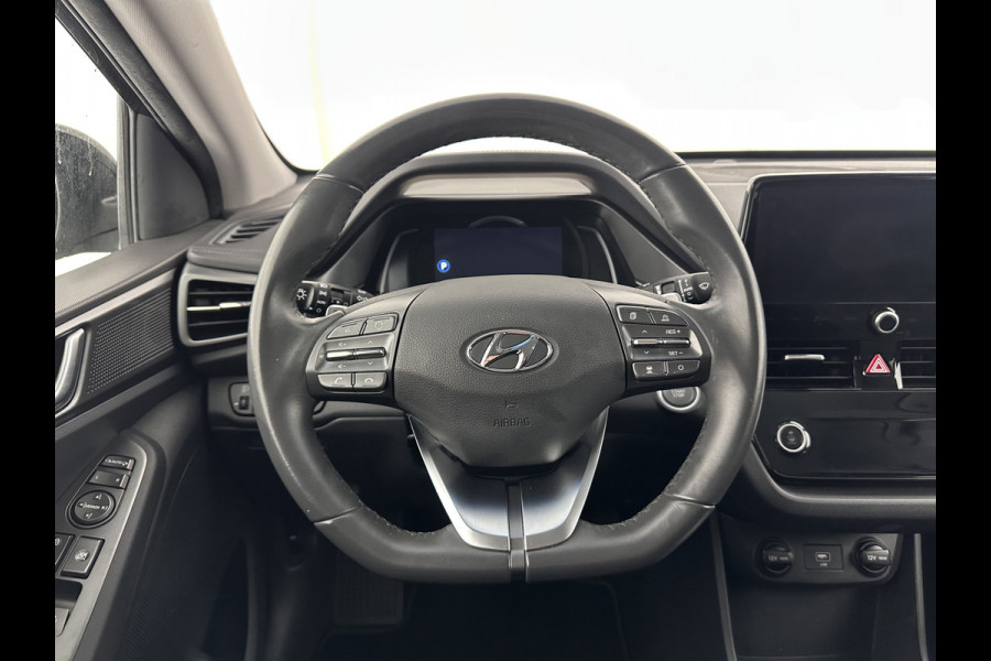 Hyundai IONIQ Comfort EV 38 kWh {SOH-100%} (INCL.BTW) *FULL-LED | ADAPTIVE-CRUISE | CAMERA | KEYLESS | DAB+ | NAVI-FULLMAP | HEATED-COMFORTSEATS | PRIVACY-GLASS | ECC | PDC | 16''ALU*