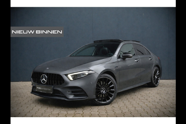 Mercedes-Benz A-Klasse 180 Business Solution AMG | Panoramadak | Memory Seats | Ambiance Verlichting | Stoelverwarming | Camera | Navigatie | Apple Carplay | Keyless | Dodehoekdetectie | Cruise Control | DAB |