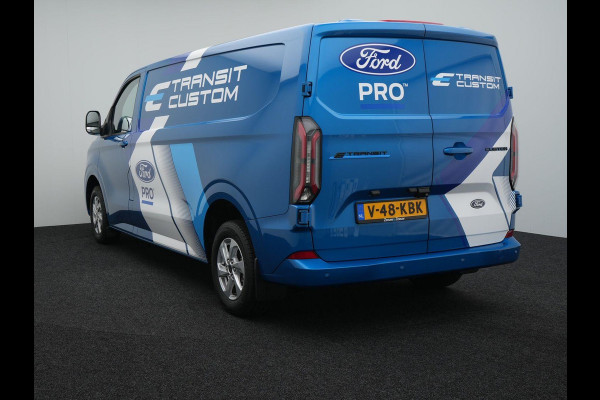 Ford E-Transit Cust. 320 L2H1 Limited 65 kWh 218pk | Wegklapbare Trekhaak | Adaptieve Cruise | Navigatie | BESTICKERING WORDT VERWIJDERD | Stoel/stuurverwarming