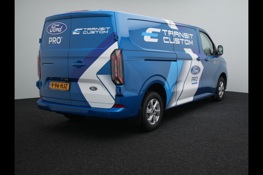 Ford E-Transit Cust. 320 L2H1 Limited 65 kWh 218pk | Wegklapbare Trekhaak | Adaptieve Cruise | Navigatie | BESTICKERING WORDT VERWIJDERD | Stoel/stuurverwarming
