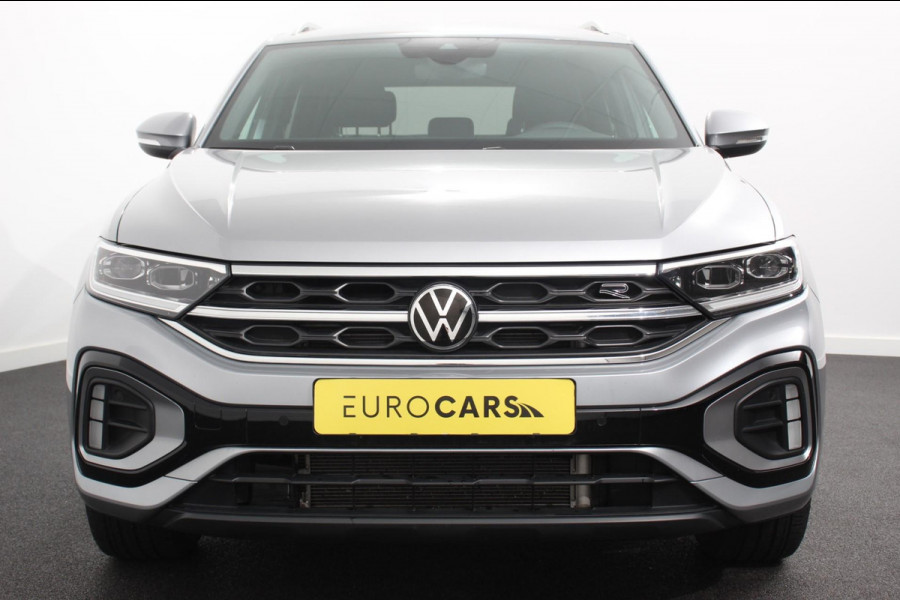 Volkswagen T-Roc 1.5 TSI 150pk DSG R-Line | Navigatie | Apple Carplay/Android Auto | Parkeersensoren | Camera | Blind Spot Assist | Adaptive Cruise Control | Elektrische achterklep | Stoel- en stuurverwarming | Climate Control | Ledverlichting | Virtual Cockpit