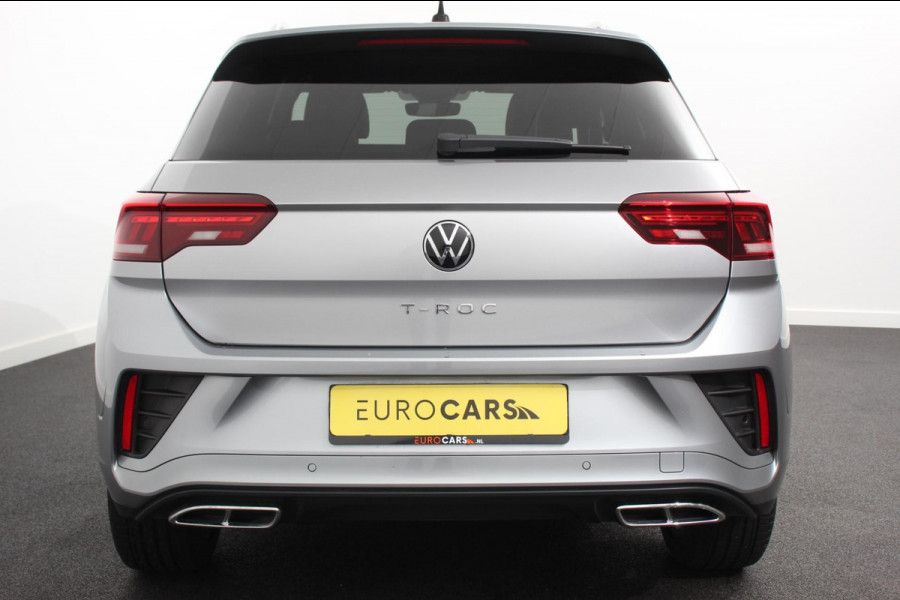 Volkswagen T-Roc 1.5 TSI 150pk DSG R-Line | Navigatie | Apple Carplay/Android Auto | Parkeersensoren | Camera | Blind Spot Assist | Adaptive Cruise Control | Elektrische achterklep | Stoel- en stuurverwarming | Climate Control | Ledverlichting | Virtual Cockpit