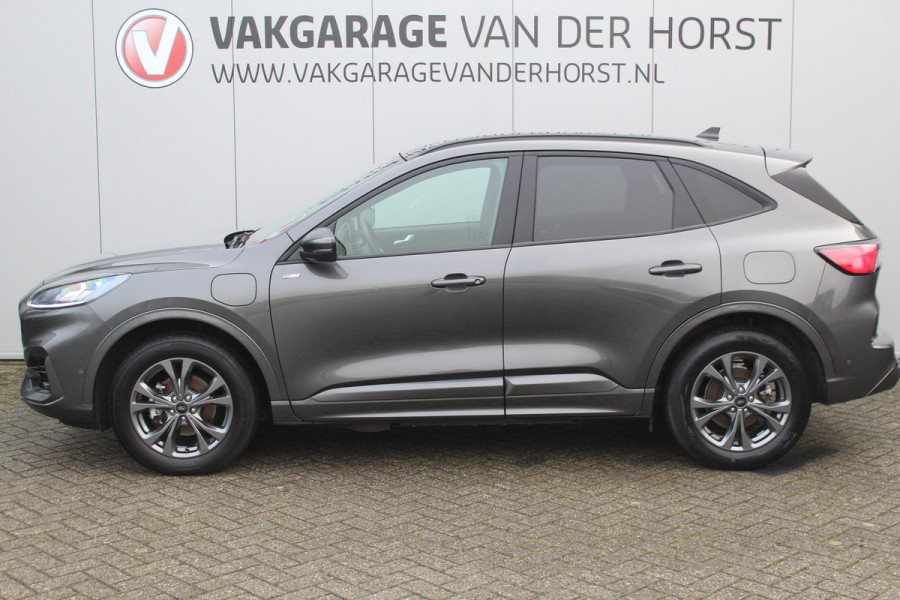 Ford Kuga 2.5-225pk Plug-in Hybrid ST-Line X. Hybride rijden voor een reële prijs ! Adaptive Cruise Control, Stoel-, achterbank, stuur- en voorraamverwarming, autm. airco dual, camera v+a, elektr. achterklep, side- en lane assist etc.