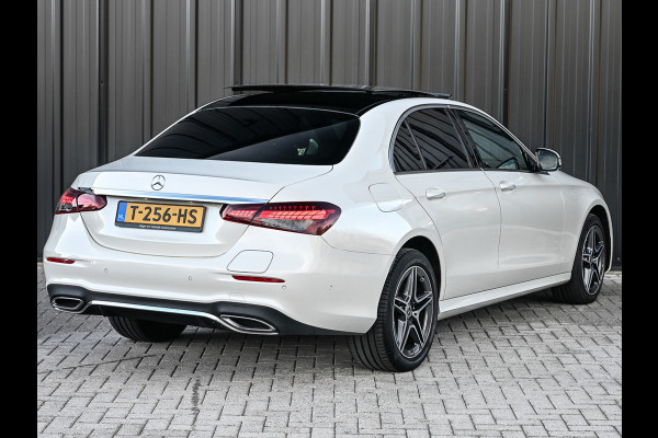 Mercedes-Benz E-Klasse 300 e 4MATIC 320pk AMG Line | Panorama dak | Burmester Sound | Distronic | Memory seats | Head-Up | Ambiance interieur  | Camera 360 | Full Led