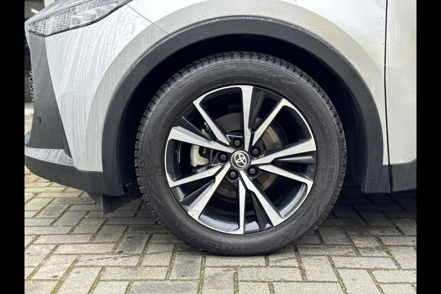 Toyota C-HR 1.8 Hybrid First edition | Dodehoekherkenning, Stoel + Stuurverwarming, Groot scherm, Parkeersensoren