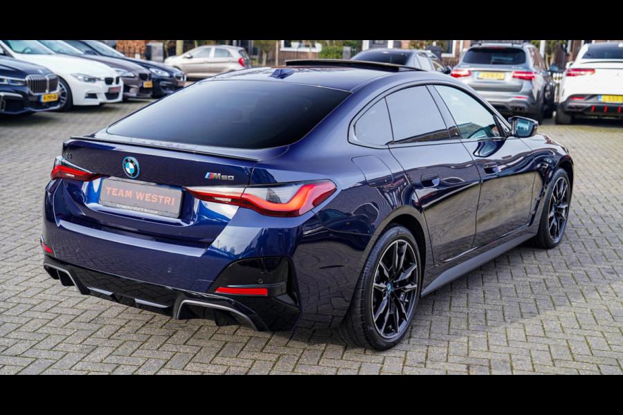 BMW i4 M50 High Executive 84 kWh | Schuifdak | BTW incl. | Harman/Kardon | Head up | Adaptieve cruise | Kuipstoelen | 360 cam |