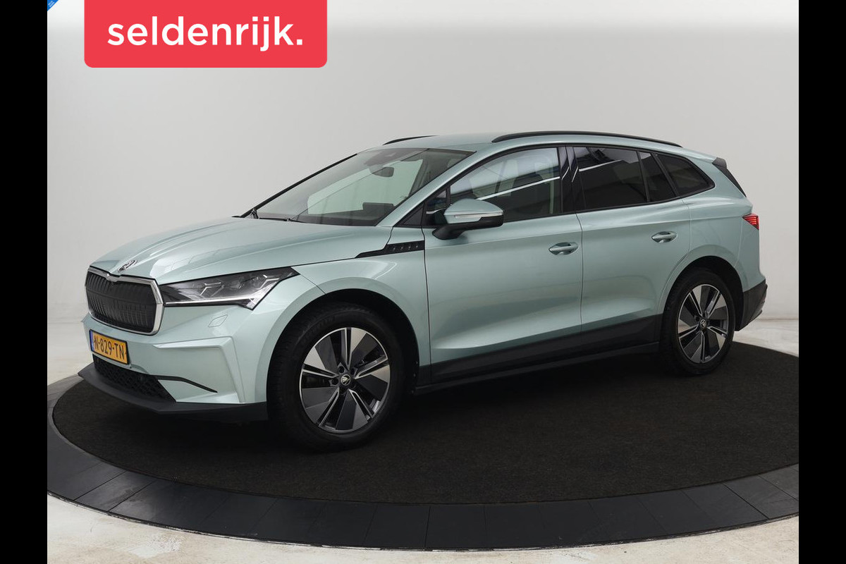 Škoda ENYAQ iV 60 | Stoelverwarming | Adaptive cruise | Warmtepomp | Matrix LED | Keyless | Carplay | Stuurverwarming | Navigatie | Sfeerverlichting | Half leder | Climate control