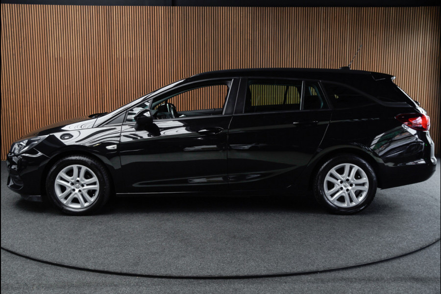 Opel Astra Sports Tourer 1.4 Navi Stoel- & stuurverw. Airco Carplay PDC Cruise LM velgen BTW auto