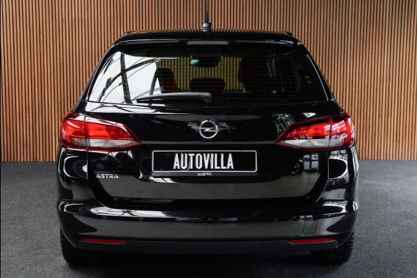 Opel Astra Sports Tourer 1.4 Navi Stoel- & stuurverw. Airco Carplay PDC Cruise LM velgen BTW auto
