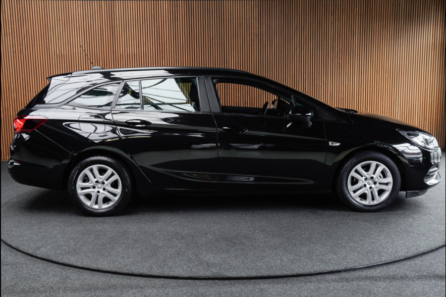Opel Astra Sports Tourer 1.4 Navi Stoel- & stuurverw. Airco Carplay PDC Cruise LM velgen BTW auto