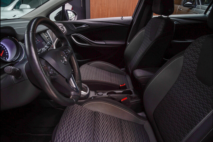 Opel Astra Sports Tourer 1.4 Navi Stoel- & stuurverw. Airco Carplay PDC Cruise LM velgen BTW auto