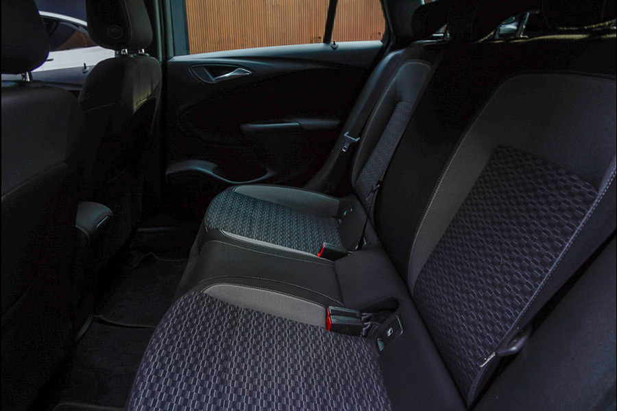 Opel Astra Sports Tourer 1.4 Navi Stoel- & stuurverw. Airco Carplay PDC Cruise LM velgen BTW auto