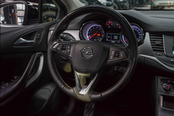 Opel Astra Sports Tourer 1.4 Navi Stoel- & stuurverw. Airco Carplay PDC Cruise LM velgen BTW auto