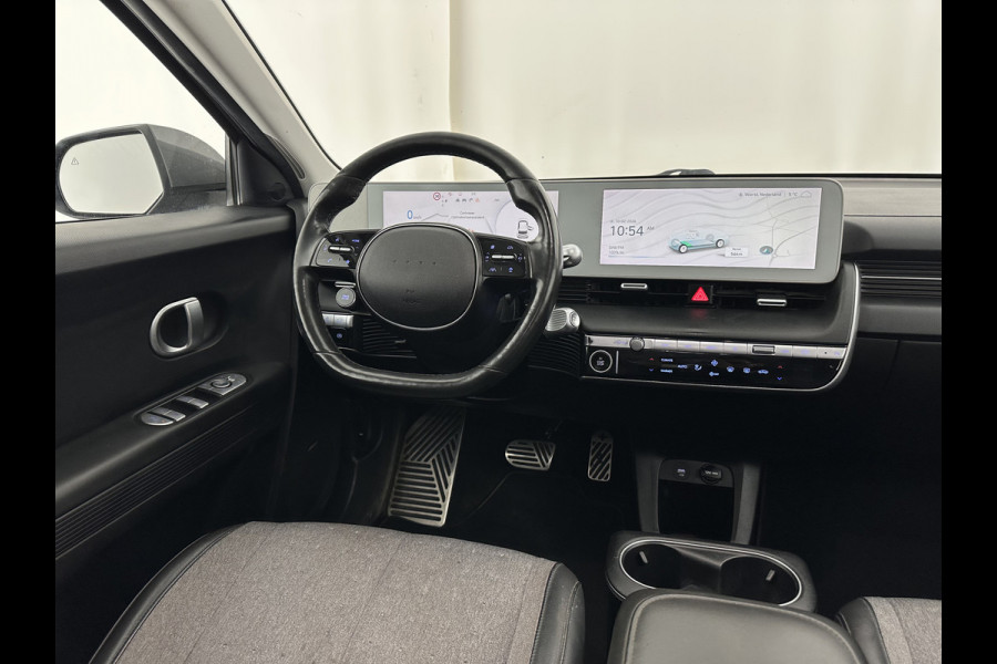 Hyundai IONIQ 5 Connect 73kWh [ 3-Fase ] {SOH-100%} (INCL-BTW) Aut *LEATHER-FABRIC | FULL-LED | DIGI-COCKPIT | AMBIENT-LIGHT | DAB | SHIFT-PADDLES | HEAD-UP | NAVI-FULLMAP | KEYLESS | CAMERA | HEATED-COMFORTSEATS | TOWBAR*