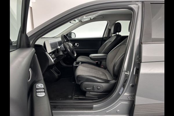 Hyundai IONIQ 5 Connect 73kWh [ 3-Fase ] {SOH-100%} (INCL-BTW) Aut *LEATHER-FABRIC | FULL-LED | DIGI-COCKPIT | AMBIENT-LIGHT | DAB | SHIFT-PADDLES | HEAD-UP | NAVI-FULLMAP | KEYLESS | CAMERA | HEATED-COMFORTSEATS | TOWBAR*