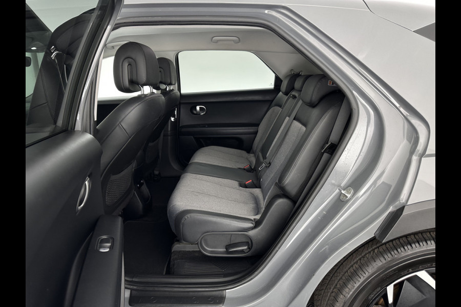 Hyundai IONIQ 5 Connect 73kWh [ 3-Fase ] {SOH-100%} (INCL-BTW) Aut *LEATHER-FABRIC | FULL-LED | DIGI-COCKPIT | AMBIENT-LIGHT | DAB | SHIFT-PADDLES | HEAD-UP | NAVI-FULLMAP | KEYLESS | CAMERA | HEATED-COMFORTSEATS | TOWBAR*