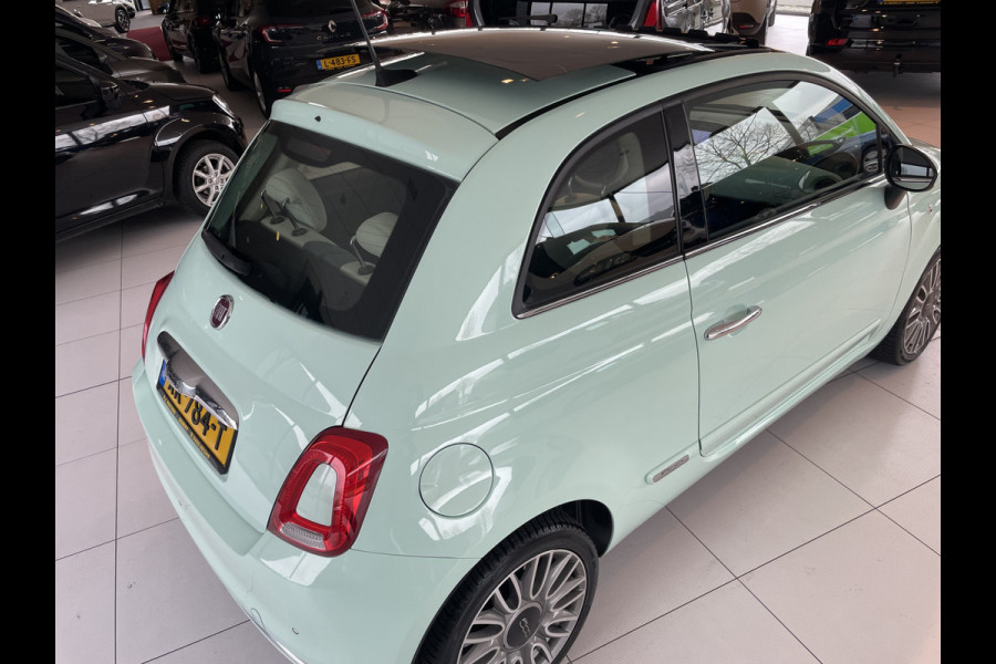 Fiat 500 0.9 TwinAir Turbo Collezione met schuif/kanteldak Airco - Cruise control - parkeersensor achter - Navigatie - Panoramadak - Schuif/kantel dak - Mistlampen voor - Licht metalen velgen 16 inch - Stuur multifunctioneel - Radio - Bluetooth - Sta