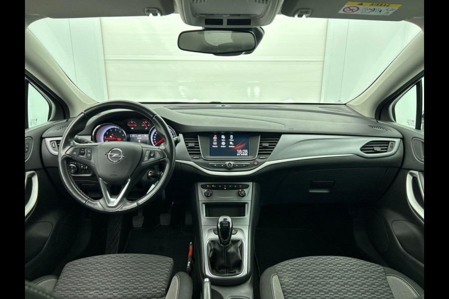 Opel Astra Sports Tourer 1.2 Edition Airco ECC AGR Comfortstoel PDC VA+ Camera Navi Carplay Full LED Cruise Control Blind Spot APK 08-2027!