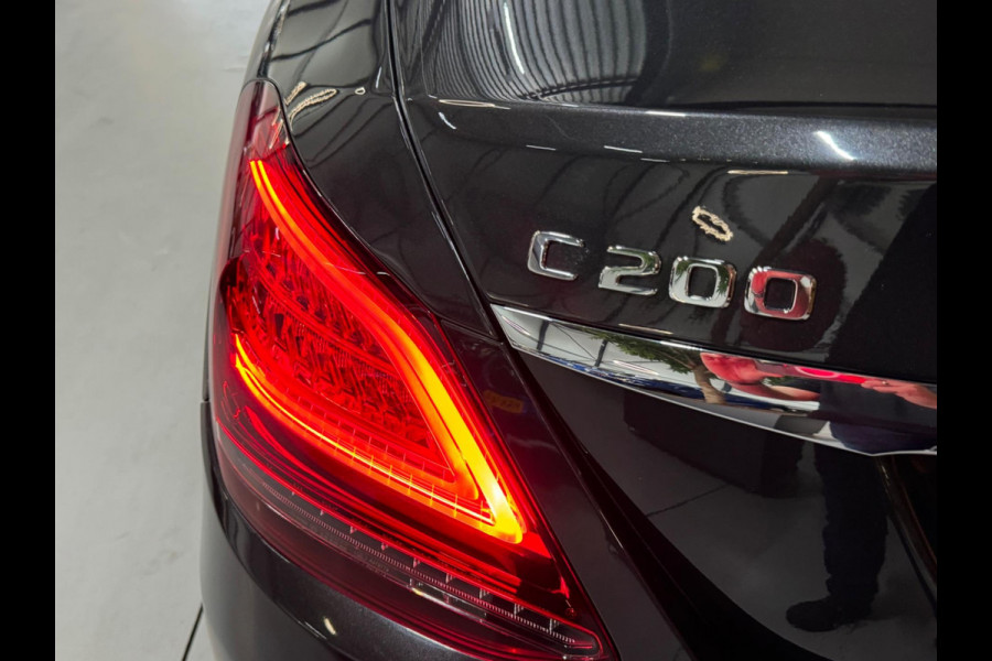 Mercedes-Benz C-Klasse 200 Business Solution AMG Garantie NAP Pano Camera PDC Cruise Digitale Cockpit Sfeer Clima Navi Rijklaar