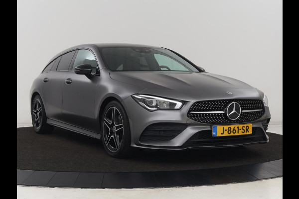 Mercedes-Benz CLA-Klasse 180d Business Solution AMG | Stoelverwarming | Carplay | Camera | Leder/Alcantara | Navigatie | Widescreen | Sfeerverlichting | Designo Mountaingrijs Magno