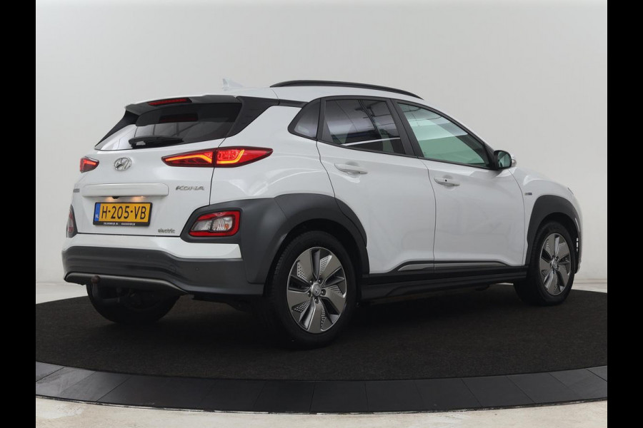 Hyundai Kona EV Premium 64 kWh | SOH 100% | 3 Fase | Stoelventilatie | Leder | Head-Up | Warmtepomp | Trekhaak | Achterbankverwarming | Adaptive cruise | Camera | Carplay | Full LED