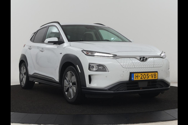 Hyundai Kona EV Premium 64 kWh | SOH 100% | 3 Fase | Stoelventilatie | Leder | Head-Up | Warmtepomp | Trekhaak | Achterbankverwarming | Adaptive cruise | Camera | Carplay | Full LED
