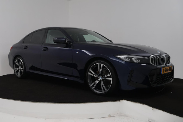 BMW 3 Serie 318i (STOELVERWARMING, STUURVERWARMING, ACHTERUITRIJCAMERA, PARKEERSENSOREN, NAVIGATIE)