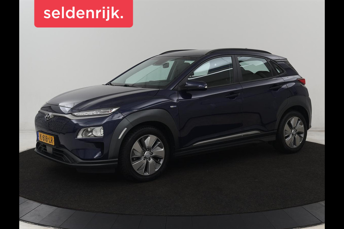 Hyundai Kona EV Comfort 64 kWh | SOH 100% | 3 Fase | Adaptive cruise | Krell Audio | Warmtepomp | Keyless | Camera | Carplay | Navigatie